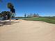 Beautiful golf course view featuring lush green fairway and sand trap offering a premier golfing experience at 15149 Canoe Pl, Winter Garden, FL 34787