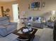 Cozy living room with neutral colors, comfortable seating, and stylish decor at 15149 Canoe Pl, Winter Garden, FL 34787