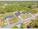 An aerial view of the home's setting, with a large lot surrounded by lush greenery and neighboring homes at 16745 Sw 29Th Terrace, Ocala, FL 34473
