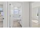 This bathroom has a tub, a window, and a vanity with black hardware at 16745 Sw 29Th Terrace, Ocala, FL 34473
