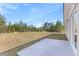 Spacious backyard with concrete patio, ideal for outdoor entertaining and relaxation at 16753 Sw 29Th Terrace, Ocala, FL 34473