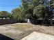 Spacious backyard perfect for outdoor activities and entertainment with mature shade trees at 191 Caldwell St, Apopka, FL 32712