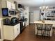 Spacious kitchen with an island, updated appliances, and ample storage at 191 Caldwell St, Apopka, FL 32712