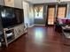 Cozy living room with hardwood floors, natural light, and a comfortable seating area at 191 Caldwell St, Apopka, FL 32712