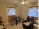Bedroom with floral print window coverings and ceiling fan at 2108 Wolf Rd, Orlando, FL 32808
