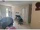 View of the living room with tile flooring and a decorative fireplace at 2108 Wolf Rd, Orlando, FL 32808