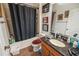 Functional bathroom with a shower-tub combination and a vanity with granite countertops at 212 Lugano Way, Debary, FL 32713