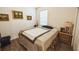 Cozy bedroom with hardwood floors, natural light, and space for a comfortable layout at 212 Lugano Way, Debary, FL 32713