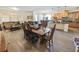 Open-concept dining and living areas with tile flooring and plenty of natural light at 212 Lugano Way, Debary, FL 32713