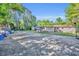Expansive backyard featuring playground, basketball court, gazebo and home at 225 N Phippen Ave, Deland, FL 32724