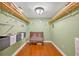 Spacious walk-in closet with built-in shelves and a crib at 225 N Phippen Ave, Deland, FL 32724