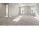 This large bedroom features two large windows that provide natural light at 2290 Sw Raven Ridge Rd, Clermont, FL 34715