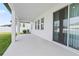Relaxing covered patio, perfect for outdoor entertaining and shaded enjoyment at 2290 Sw Raven Ridge Rd, Clermont, FL 34715