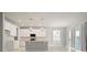 Open-concept kitchen with white cabinetry, stainless steel appliances, and island with breakfast bar seating at 2290 Sw Raven Ridge Rd, Clermont, FL 34715