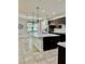 Gourmet kitchen featuring an island with a sink and pendant lights at 2301 Avellino Ave, St Cloud, FL 34771
