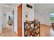 Inviting entryway with light wood floors and charming decor elements at 2811 S Peninsula Dr, Daytona Beach, FL 32118