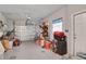 A well kept garage with storage, shelving, and other items inside at 2811 S Peninsula Dr, Daytona Beach, FL 32118