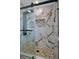 Stylish walk-in shower with decorative tile and modern fixtures at 2811 S Peninsula Dr, Daytona Beach, FL 32118