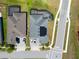 Bird's eye view of a home with a pool, patio, and solar panels on a sunny day at 2942 Wordsmith Rd, Kissimmee, FL 34746
