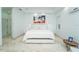 Modern bedroom with travertine floors, recessed lighting, and minimalist decor at 2942 Wordsmith Rd, Kissimmee, FL 34746