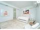 Spacious bedroom with tile floors, recessed lighting, and modern decor throughout at 2942 Wordsmith Rd, Kissimmee, FL 34746