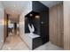 Modern foyer with recessed lighting, marble floors, and decorative statue at 2942 Wordsmith Rd, Kissimmee, FL 34746