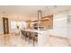 Contemporary kitchen featuring modern appliances, an island with bar seating, and sleek cabinetry at 2942 Wordsmith Rd, Kissimmee, FL 34746