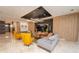 Open-concept living room featuring modern decor, plush seating, and elegant lighting at 2942 Wordsmith Rd, Kissimmee, FL 34746