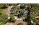 Bird's-eye view of home with mature landscaping, featuring a driveway and pool area at 308 Tangerine St, Altamonte Springs, FL 32701