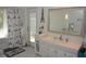 Bright bathroom with an oversized mirror, vanity storage and walk out access to the outdoors at 308 Tangerine St, Altamonte Springs, FL 32701