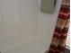 Bathroom shower with white tiles and neutral colored shower curtain at 308 Tangerine St, Altamonte Springs, FL 32701