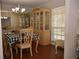Charming dining room featuring a large china cabinet and natural lighting at 308 Tangerine St, Altamonte Springs, FL 32701