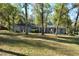 Charming one-story home with a well-maintained lawn and mature trees offering shade and curb appeal at 308 Tangerine St, Altamonte Springs, FL 32701