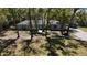 Charming single-story home with well-maintained landscaping, mature trees, and inviting curb appeal at 308 Tangerine St, Altamonte Springs, FL 32701