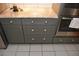 A kitchen with stainless steel appliances, granite countertops, and gray cabinetry at 308 Tangerine St, Altamonte Springs, FL 32701