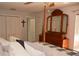 Comfortable main bedroom with a four poster bed frame with lots of closet and dresser storage at 308 Tangerine St, Altamonte Springs, FL 32701