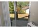 View of patio leading to backyard of home with trees and grass at 308 Tangerine St, Altamonte Springs, FL 32701