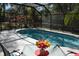 Sparkling pool surrounded by lush landscaping, offering a serene outdoor escape at 308 Tangerine St, Altamonte Springs, FL 32701