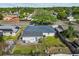 Aerial view of fenced backyard with a garden, lawn, and access to the main home at 3840 Cedarwaxwing Ave, Orlando, FL 32822