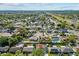 Aerial view showing the neighborhood, backyard, and proximity to neighborhood amenities at 3840 Cedarwaxwing Ave, Orlando, FL 32822