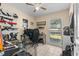 Multi-purpose room with neutral color palette, window, and desk, set up for an office at 3840 Cedarwaxwing Ave, Orlando, FL 32822