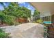 Spacious backyard area with lush landscaping and ample space for outdoor activities and relaxation at 4174 Fallwood Cir, Orlando, FL 32812