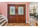 Elegant foyer with double doors and tile flooring at 4174 Fallwood Cir, Orlando, FL 32812