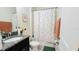This bathroom features a shower/tub combination and a modern single sink vanity at 4687 Fairy Tale Cir, Kissimmee, FL 34746