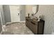 Inviting entryway with modern decor and a decorative console table with plenty of storage at 4687 Fairy Tale Cir, Kissimmee, FL 34746