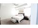 Serene main bedroom with a tray ceiling, neutral decor, and comfortable carpeting at 4687 Fairy Tale Cir, Kissimmee, FL 34746