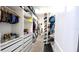 Organized walk-in closet with custom shelving and ample storage space for clothes and accessories at 4687 Fairy Tale Cir, Kissimmee, FL 34746