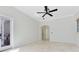 Bright bedroom with neutral walls and floors at 5067 Latrobe Dr, Windermere, FL 34786