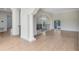 Spacious foyer with hardwood floors, pillars, and wrought iron railing at 5067 Latrobe Dr, Windermere, FL 34786