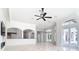 Open floorplan living room featuring bar seating and multiple doorways at 5067 Latrobe Dr, Windermere, FL 34786